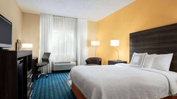 Desk, laptop workspace, blackout drapes, iron/ironing board