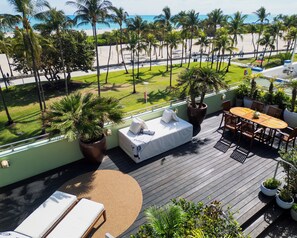 On the beach, sun-loungers, beach towels