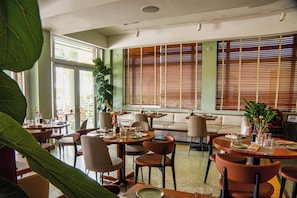 Breakfast, lunch, dinner served; international cuisine, beach views