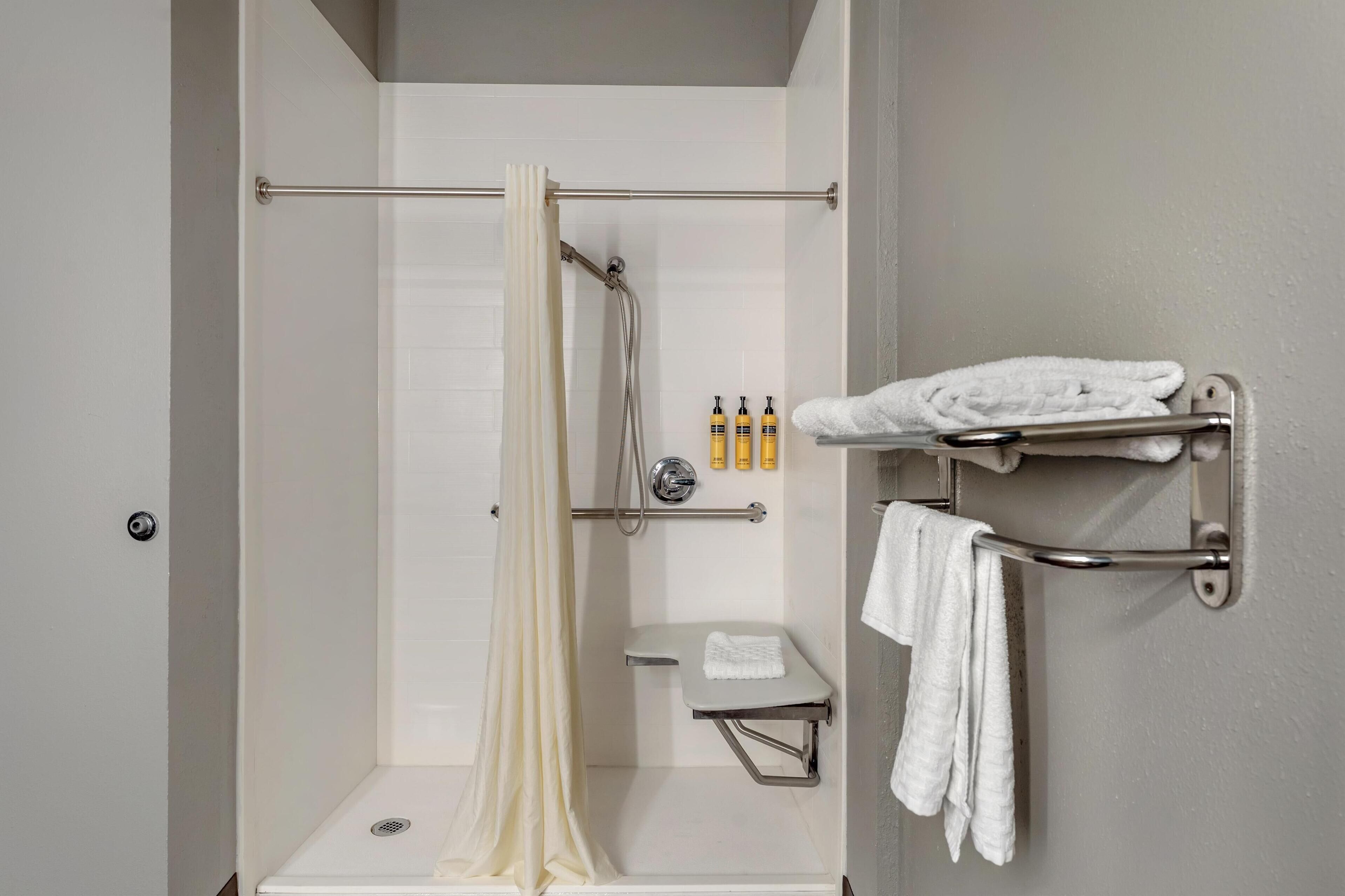 standard room, 1 king bed, accessible, refrigerator & microwave | bathroom | deep-soaking bathtub, free toiletries, hair dryer, towels