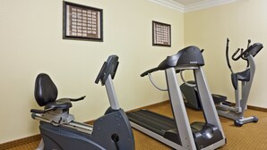 A fitness room with two treadmills and a stationary bike. - Holiday Inn Express Ringgold by IHG (Ringgold)