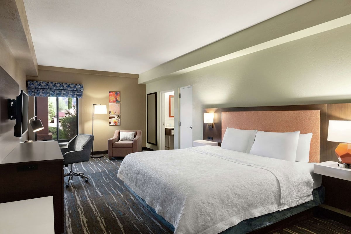 Premium bedding, blackout curtains, iron/ironing board