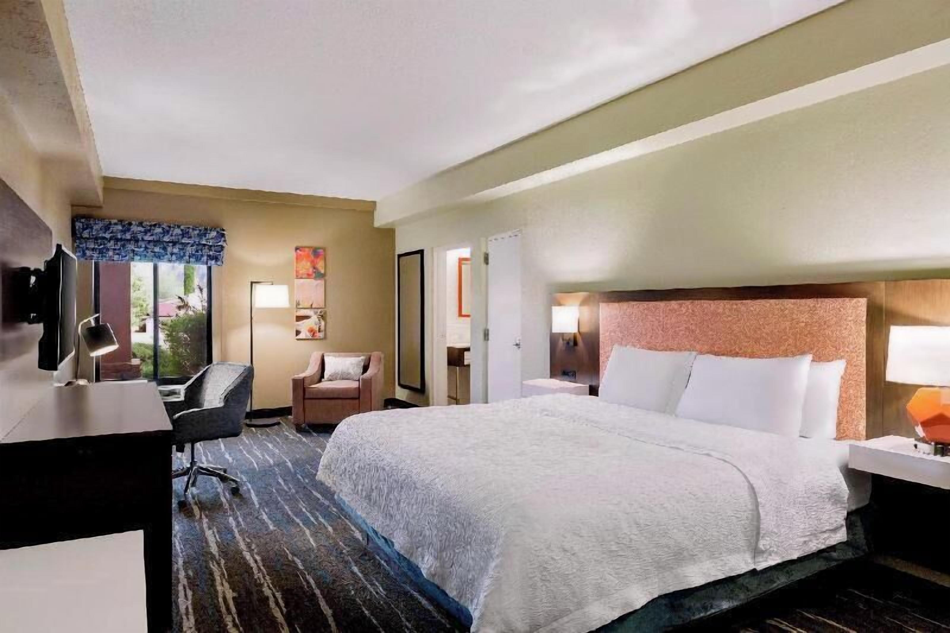 Premium bedding, blackout drapes, iron/ironing board