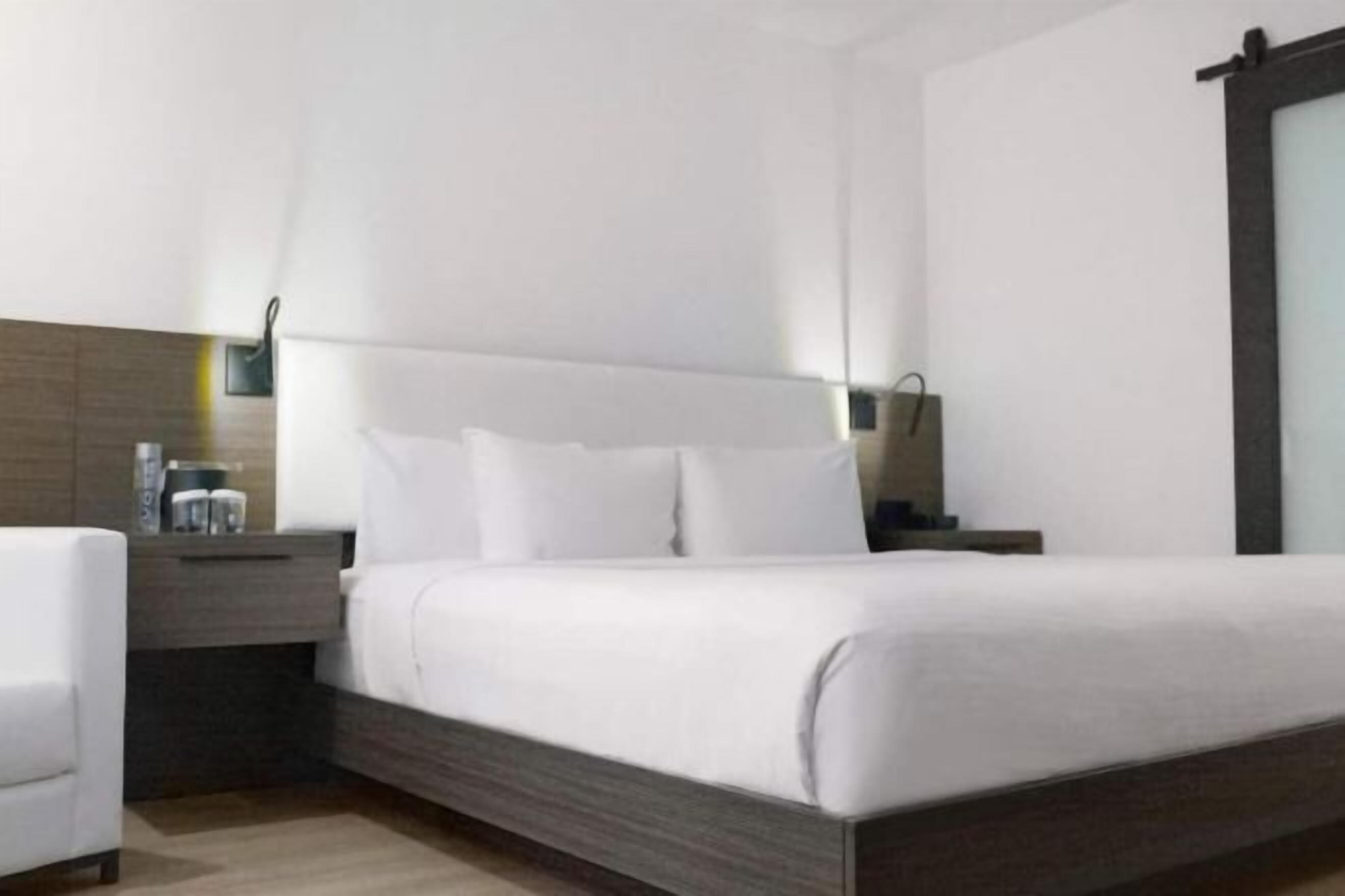 Premium bedding, pillow-top beds, in-room safe, desk