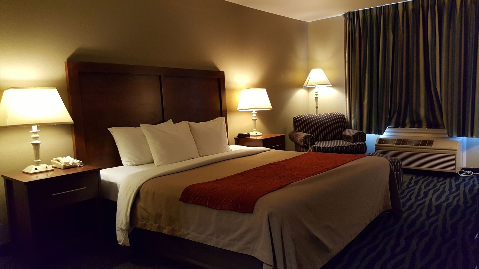 Desk, blackout drapes, iron/ironing board, rollaway beds