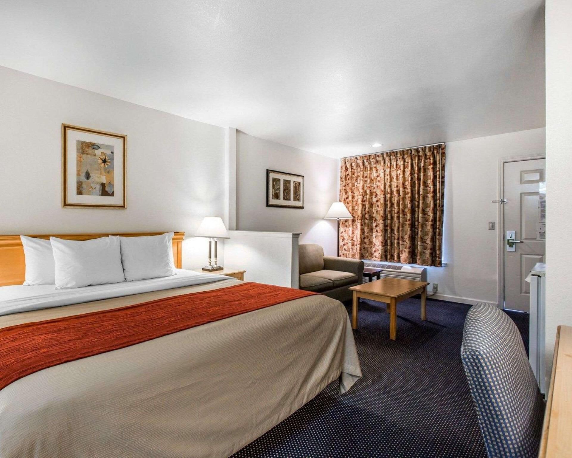 Desk, blackout drapes, iron/ironing board, rollaway beds