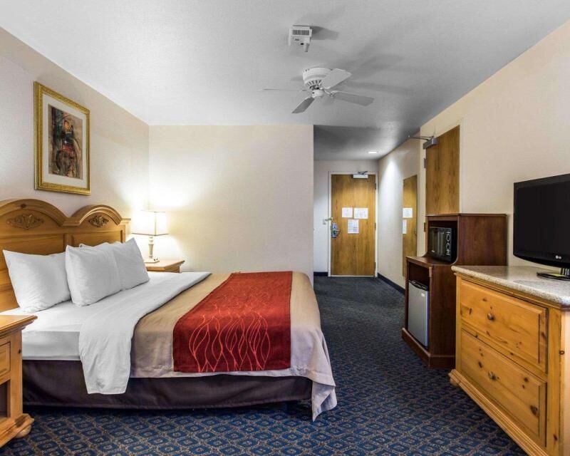 Desk, blackout drapes, iron/ironing board, rollaway beds