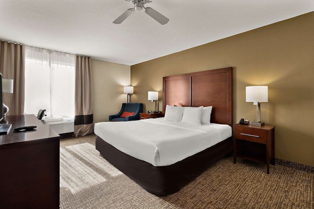 Desk, blackout drapes, iron/ironing board, rollaway beds