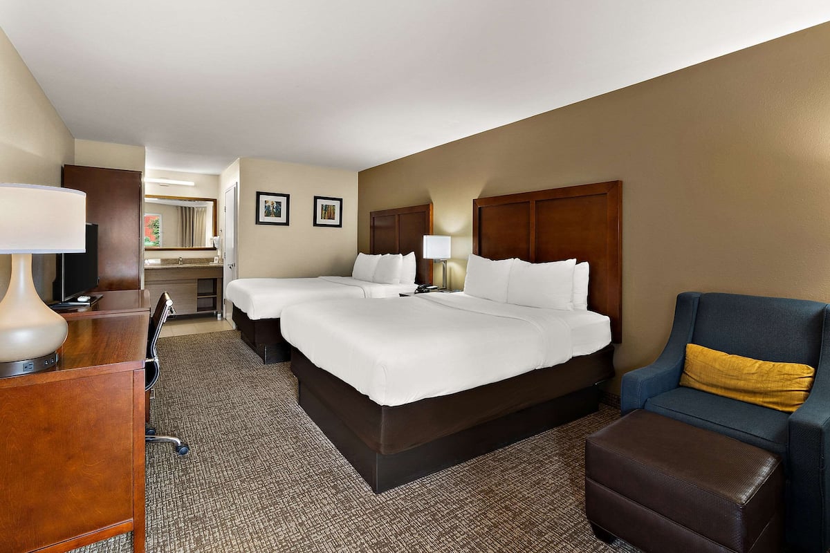 Family Suite, 2 Queen Beds, Non Smoking | Desk, blackout drapes, iron/ironing board, rollaway beds