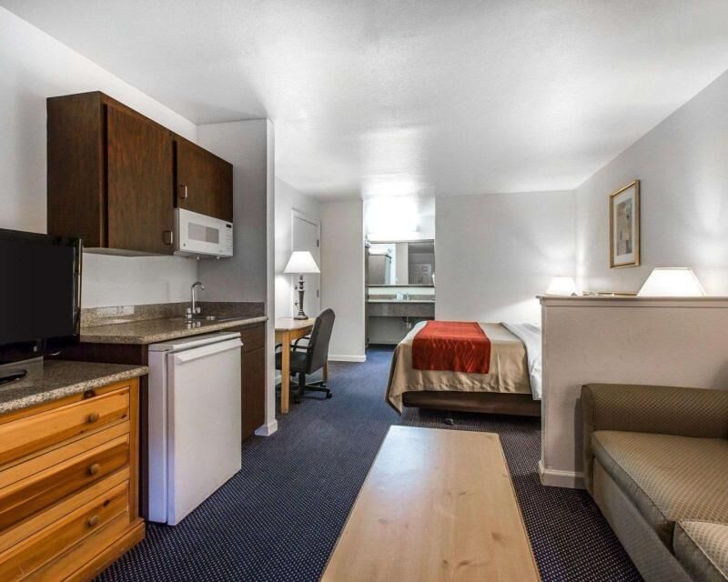 Desk, blackout drapes, iron/ironing board, rollaway beds