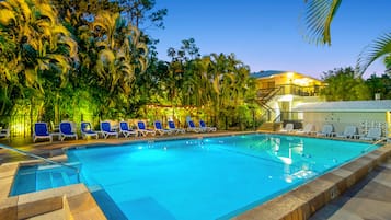 Outdoor pool, a heated pool, pool umbrellas, sun loungers