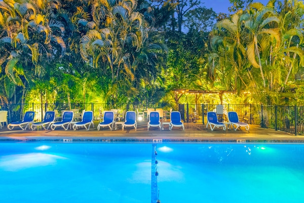 Outdoor pool, a heated pool, pool umbrellas, sun loungers