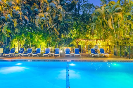Outdoor pool, a heated pool, pool umbrellas, sun loungers
