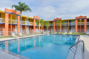 Outdoor pool, open 8 AM to 8 PM, pool umbrellas, pool loungers