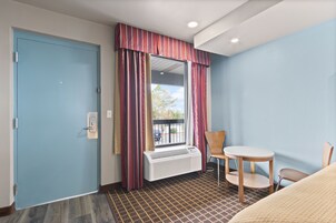 Cortinas blackout, Wi-Fi de cortesia, roupa de cama