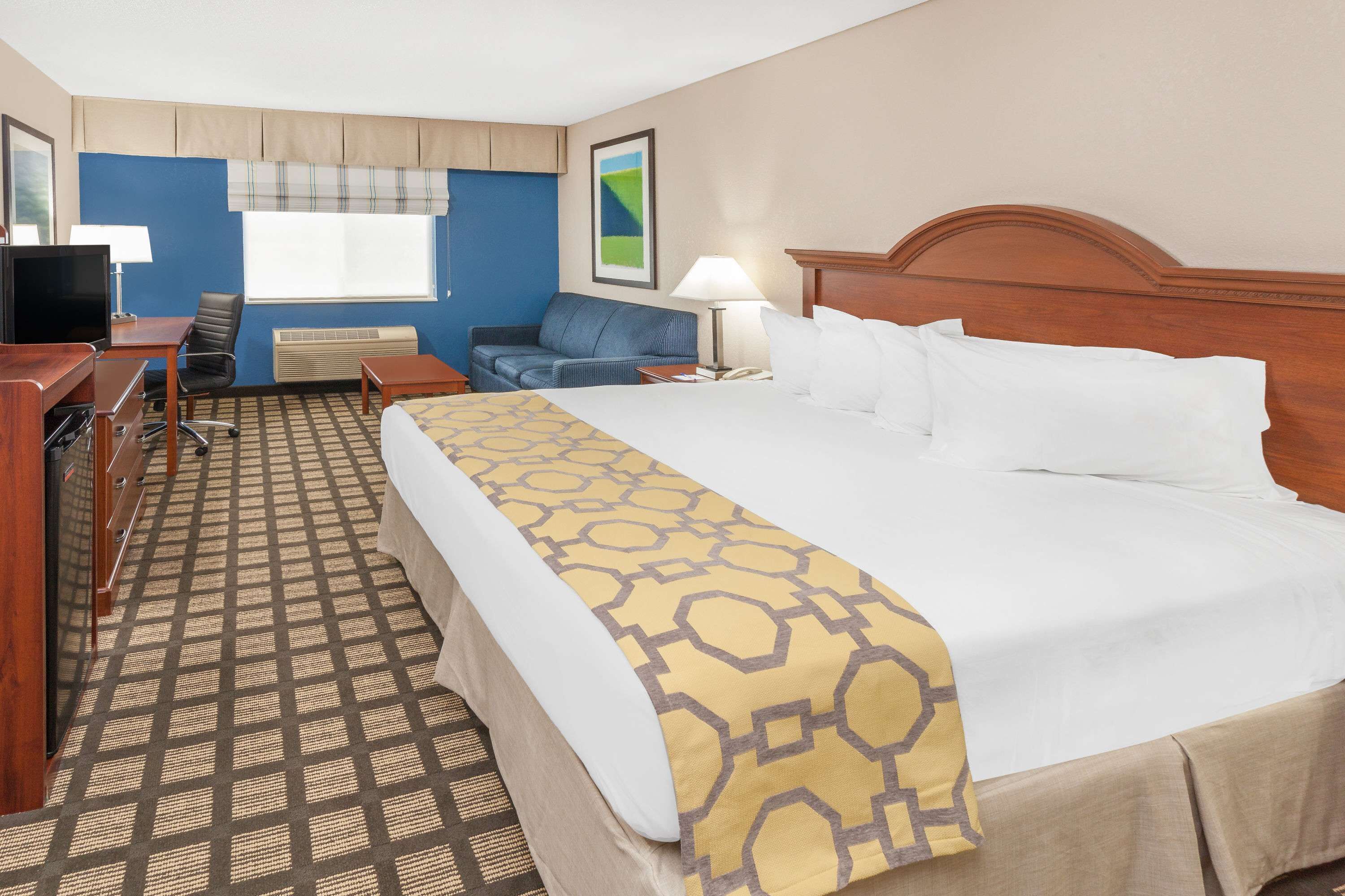 desk, laptop workspace, blackout curtains, iron/ironing board