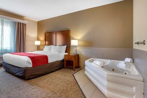 Suite, 1 King Bed, Non Smoking, Corner | Down comforters, desk, laptop workspace, blackout drapes