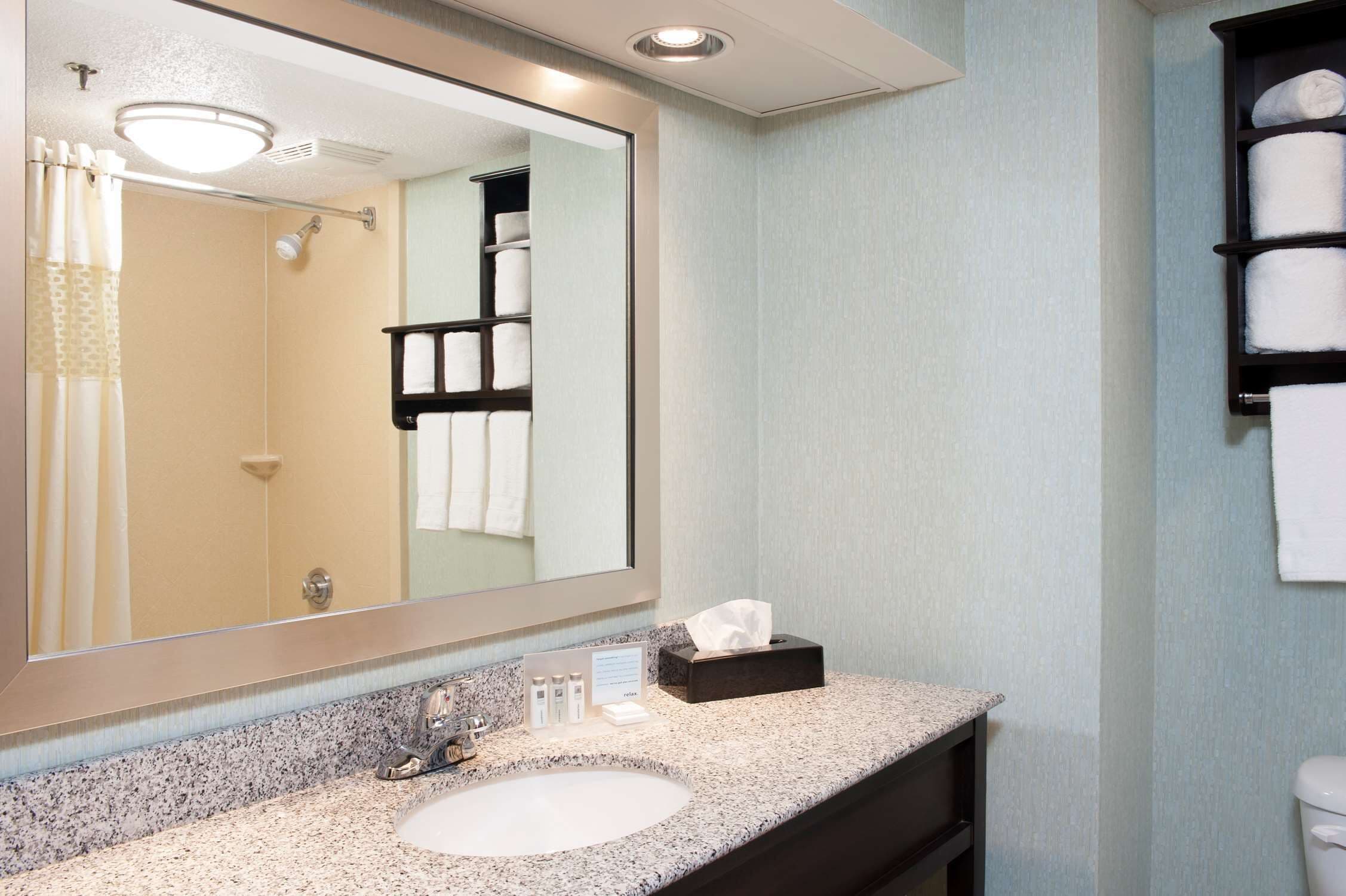 Studio, One King Bed, Non-Smoking | Bathroom | Combined shower/bathtub, free toiletries, hair dryer, towels