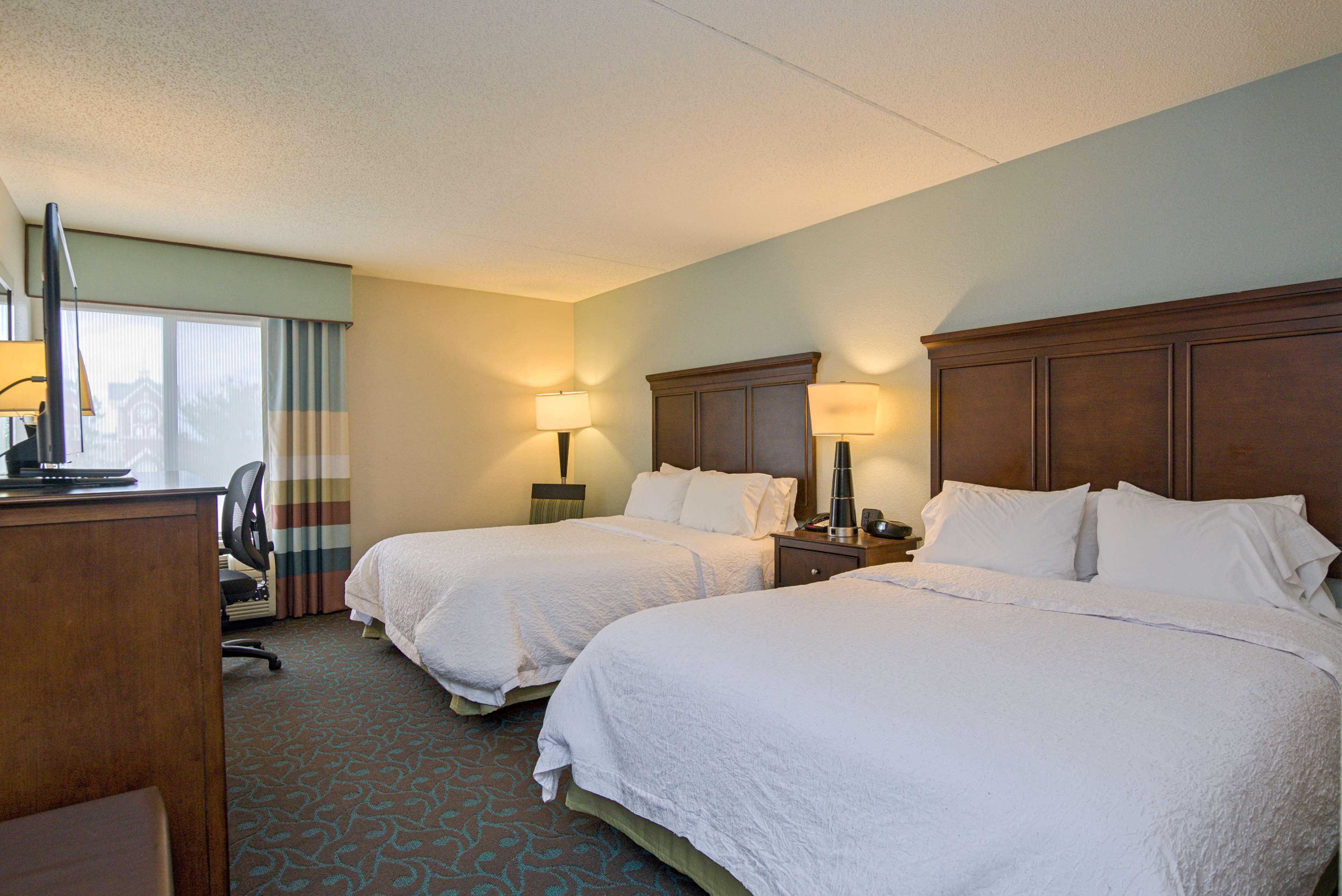 two queen beds non-smoking | premium bedding, desk, laptop workspace, blackout curtains