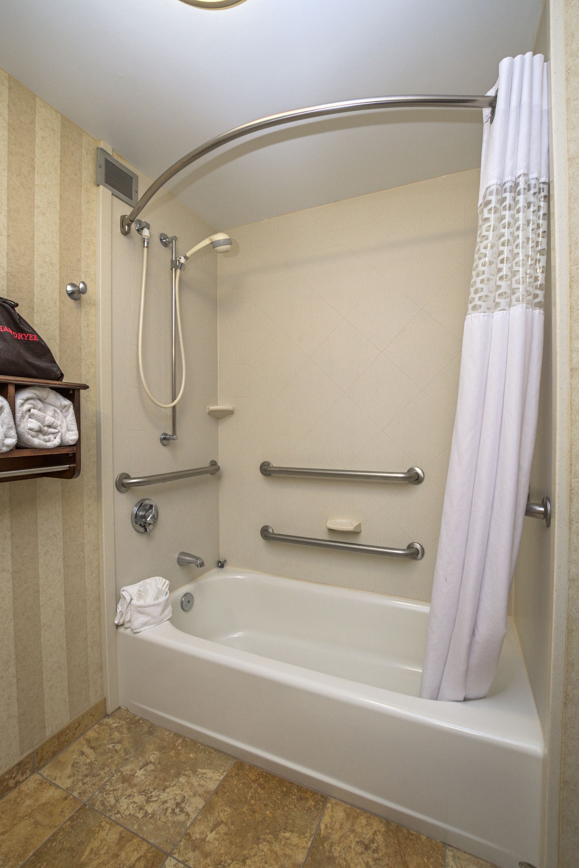 combined shower/bathtub, free toiletries, hair dryer, towels