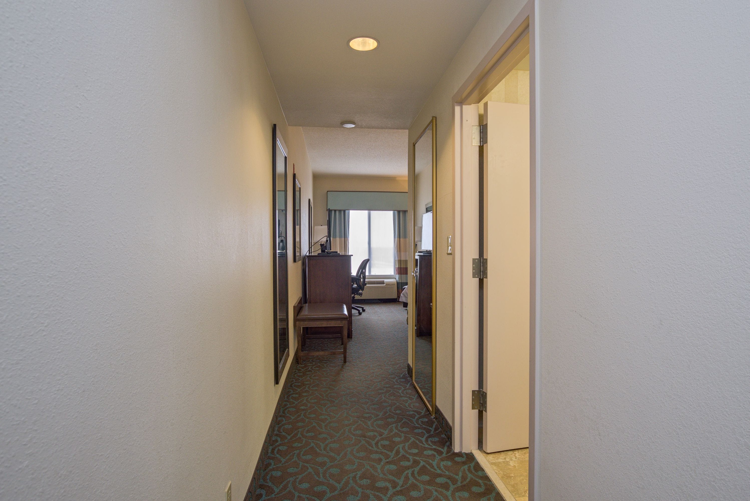 premium bedding, desk, laptop workspace, blackout curtains