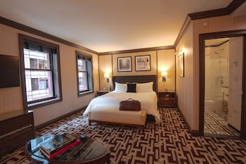 Junior Suite, City View | Frette Italian sheets, premium bedding, down comforters, pillowtop beds at The Iroquois New York