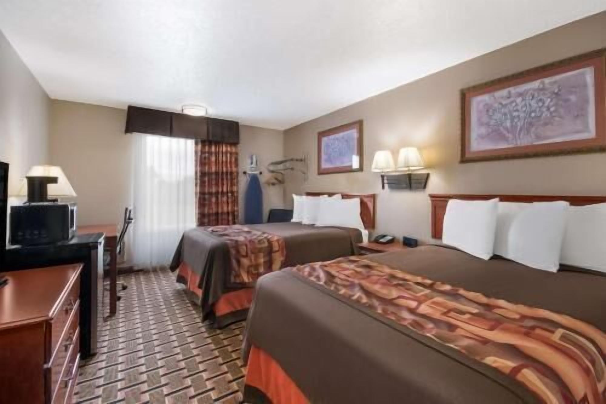 Desk, laptop workspace, free WiFi, bed sheets