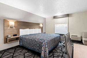 Desk, laptop workspace, free WiFi, bed sheets