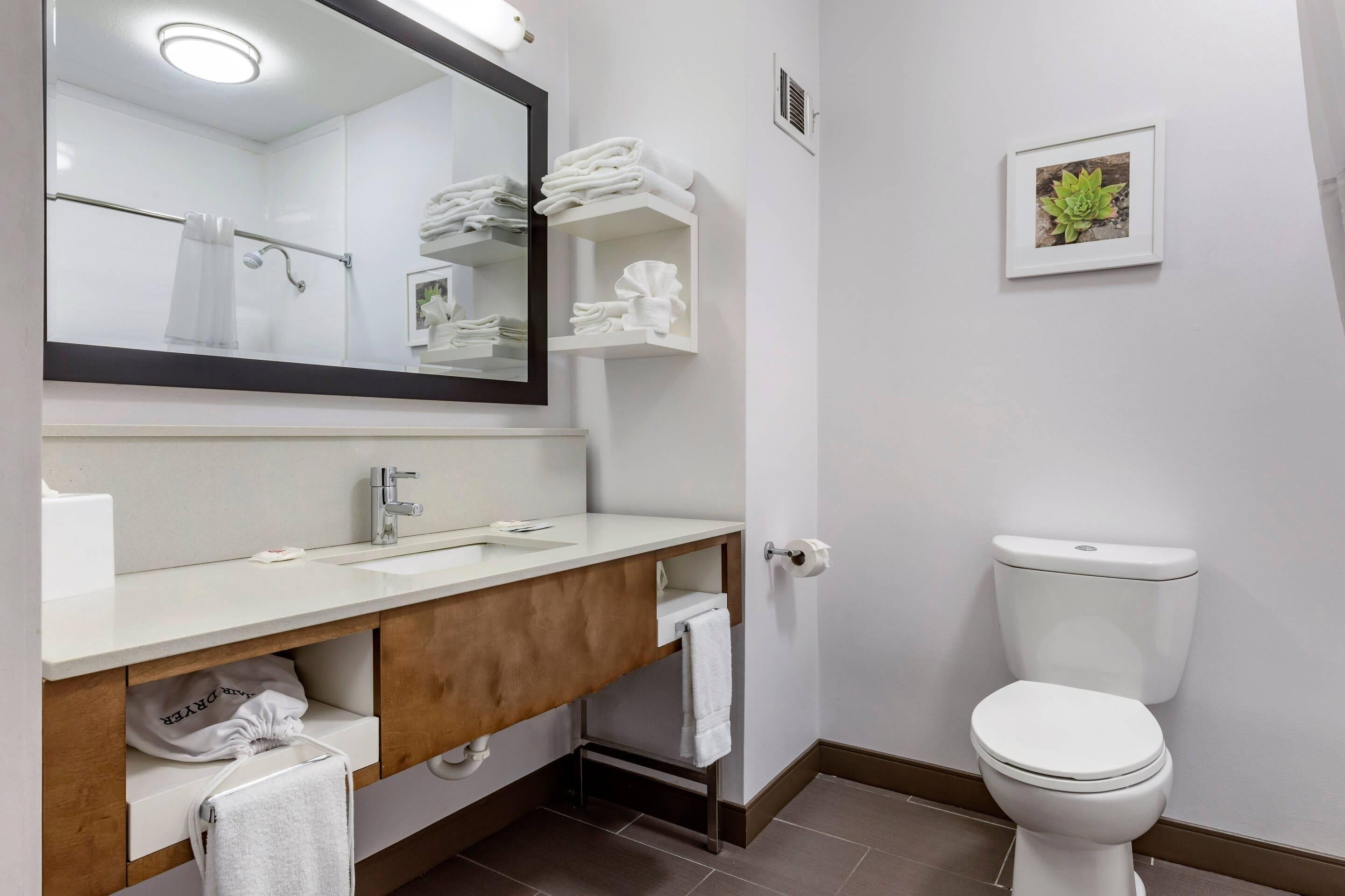 Standard Room, 2 Queen Beds, Non Smoking | Bathroom | Combined shower/tub, hair dryer, towels