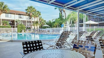 Outdoor pool, open 8:00 AM to 11:00 PM, pool umbrellas, sun loungers