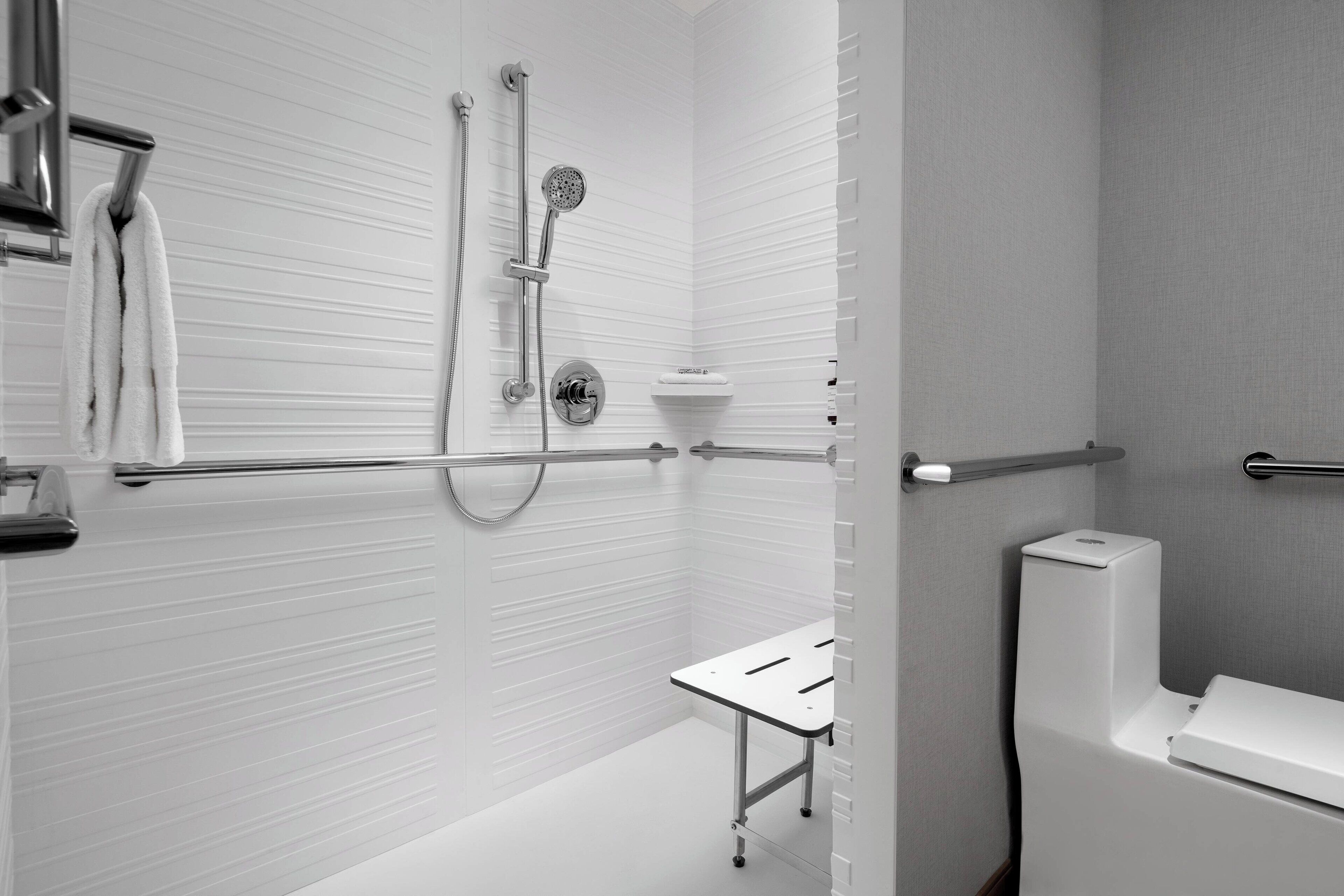 shower, hydromassage showerhead, designer toiletries, hair dryer