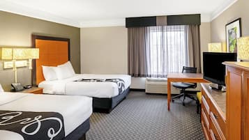 Pillow-top beds, desk, blackout curtains, iron/ironing board