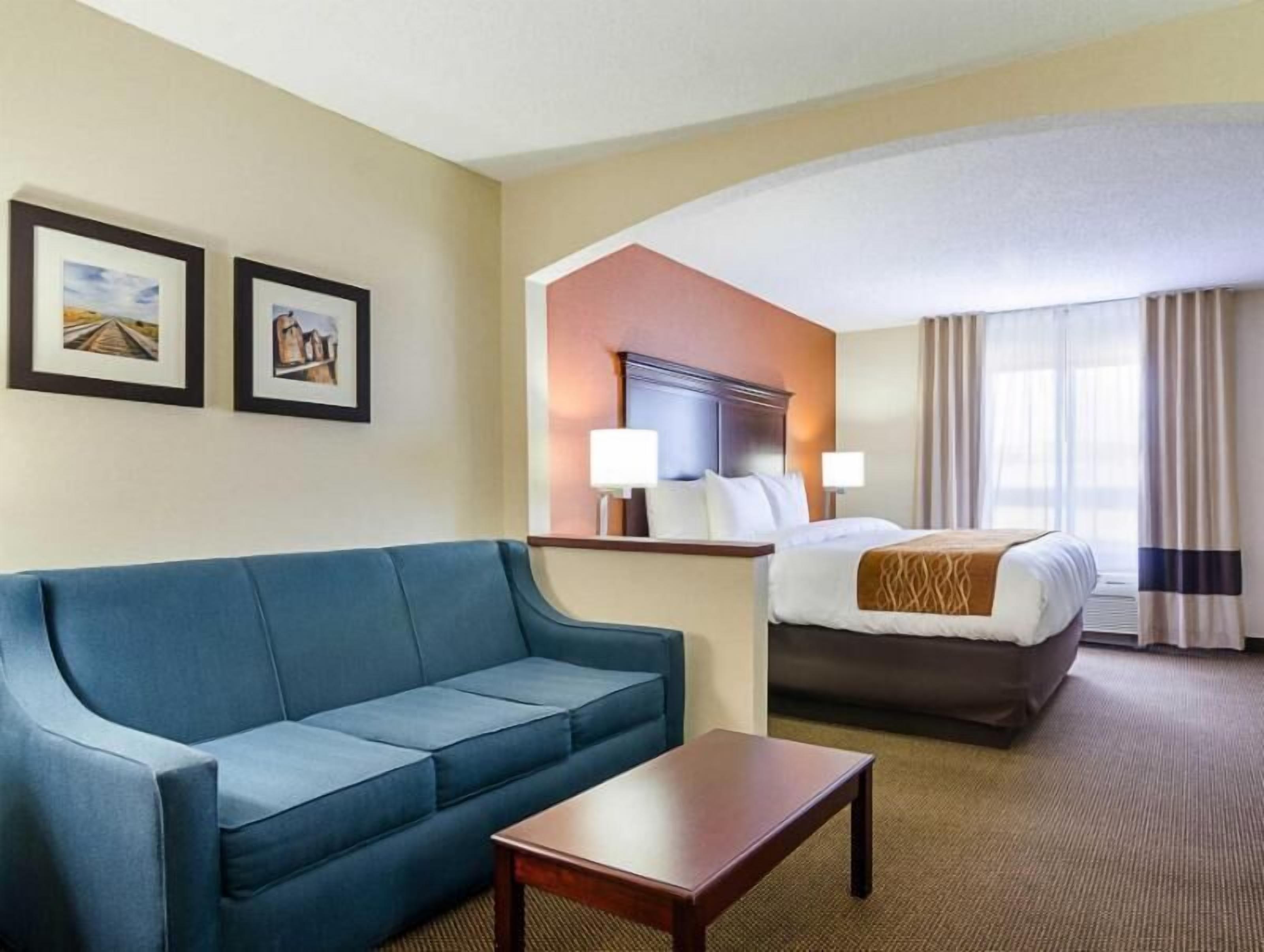 Premium bedding, desk, laptop workspace, blackout curtains