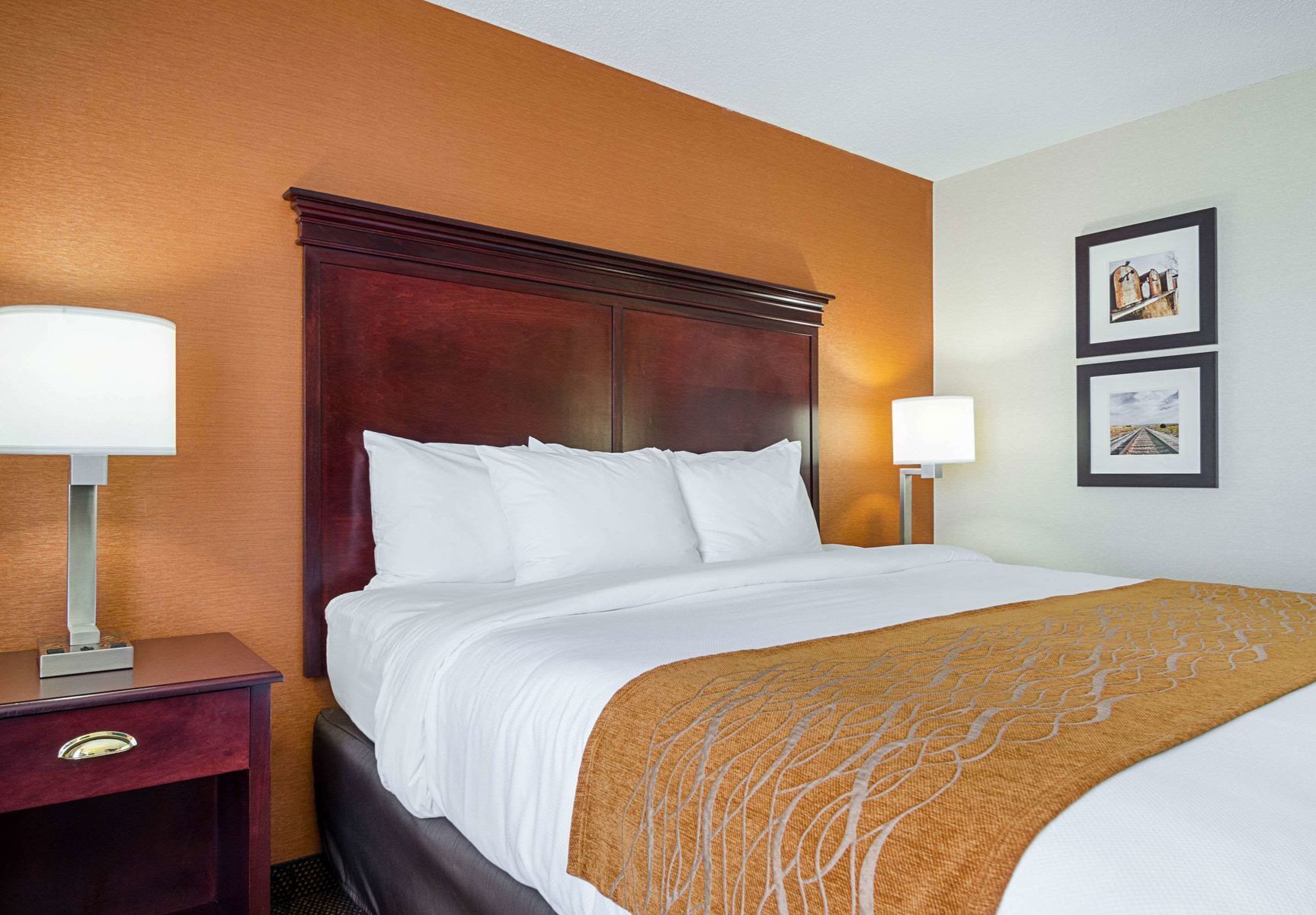 Premium bedding, desk, laptop workspace, blackout curtains