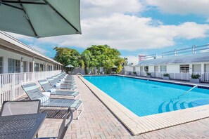 Outdoor pool, open 9:00 AM to 7:00 PM, pool umbrellas, sun loungers