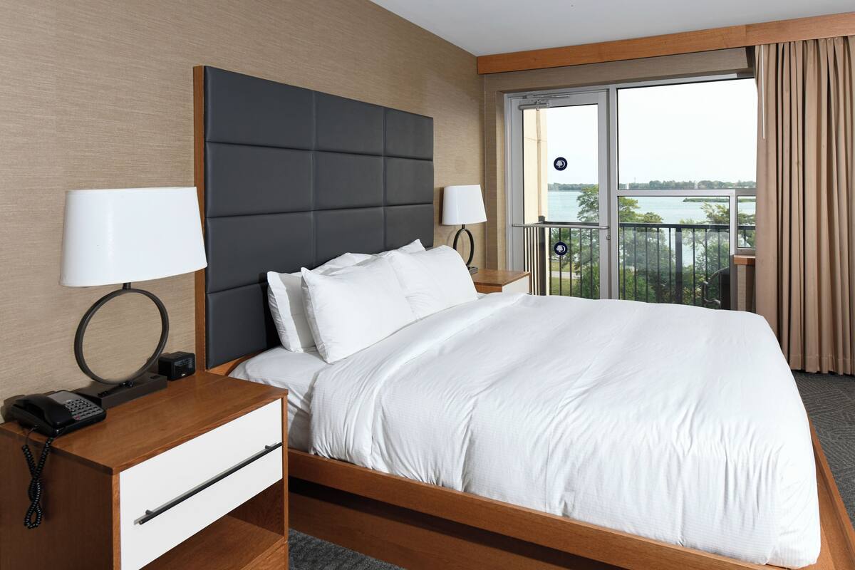 room, 1 king bed, balcony, river view | premium bedding, in-room safe, iron/ironing board, free wifi