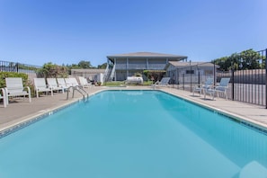 Seasonal outdoor pool, open 10 AM to 10 PM, pool umbrellas, sun loungers