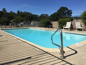 Seasonal outdoor pool, open 10 AM to 10 PM, pool umbrellas