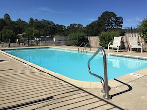 Seasonal outdoor pool, open 10 AM to 10 PM, pool umbrellas