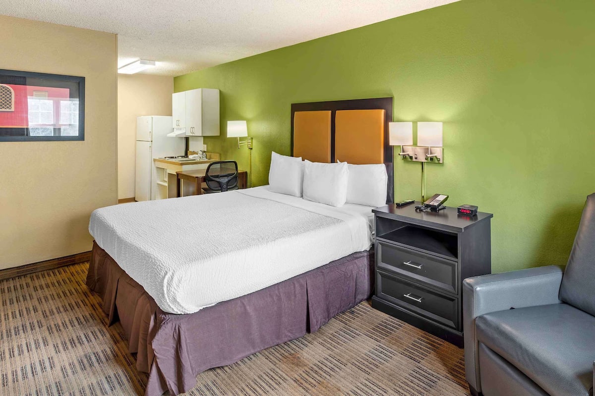 Desk, blackout drapes, iron/ironing board, rollaway beds