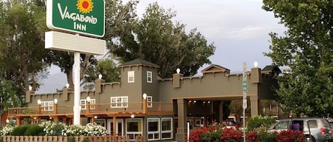 A two-story building with a sign for Vagabond Inn.