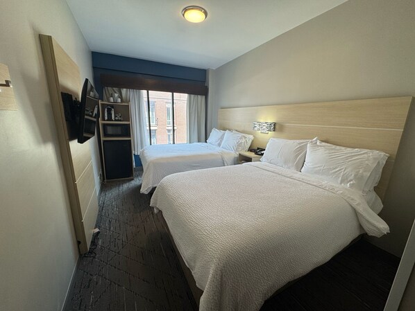 Habitación estándar, 2 camas matrimoniales | 1 habitación, ropa de cama de alta calidad y edredón 