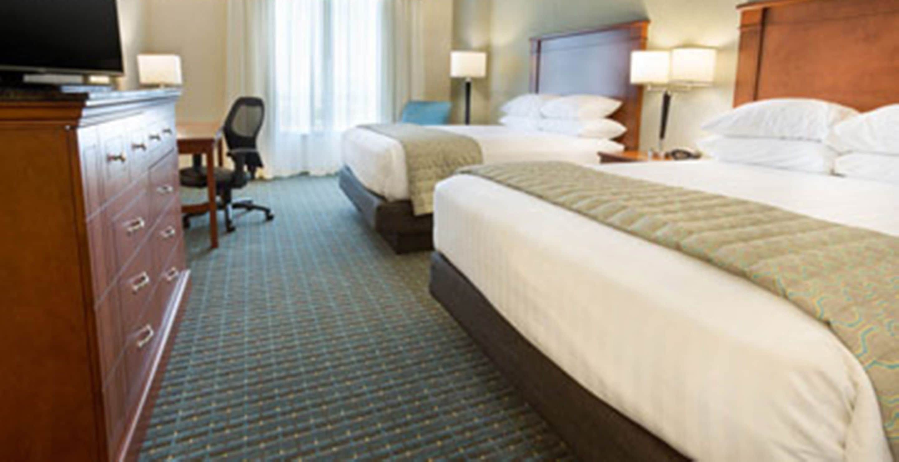 desk, laptop workspace, blackout curtains, iron/ironing board