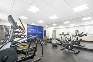 A gym with treadmills, elliptical machines, and exercise balls. - Holiday Inn Express And Suites Joplin Southeast by IHG (Joplin)
