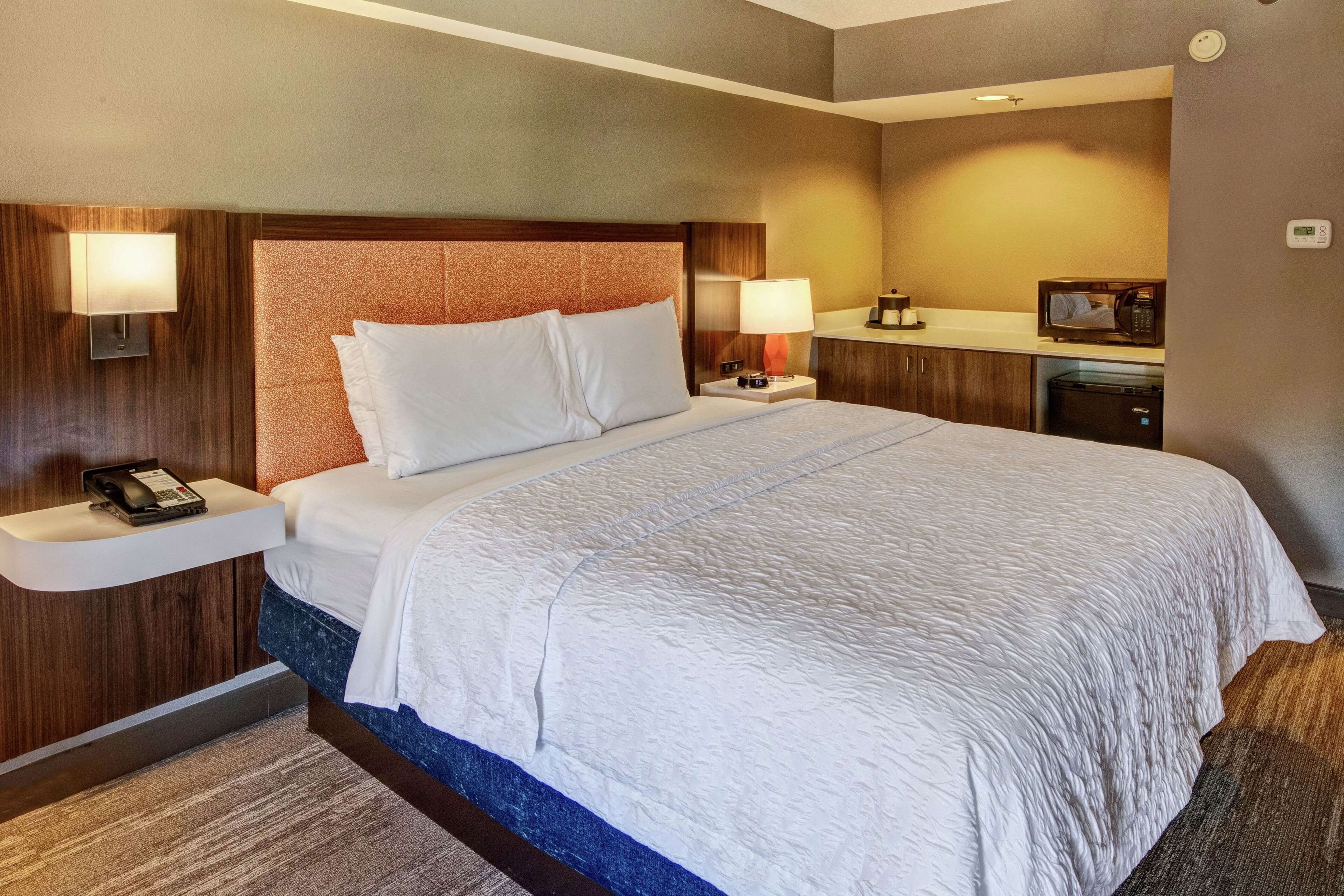 1 king bed, pool view, near elevator, non smoking | laptop workspace, iron/ironing board, free cots/infant beds, free wifi