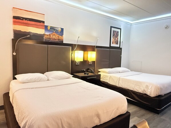 Suite, Multiple Beds, Non Smoking | Desk, blackout drapes, cribs/infant beds, rollaway beds