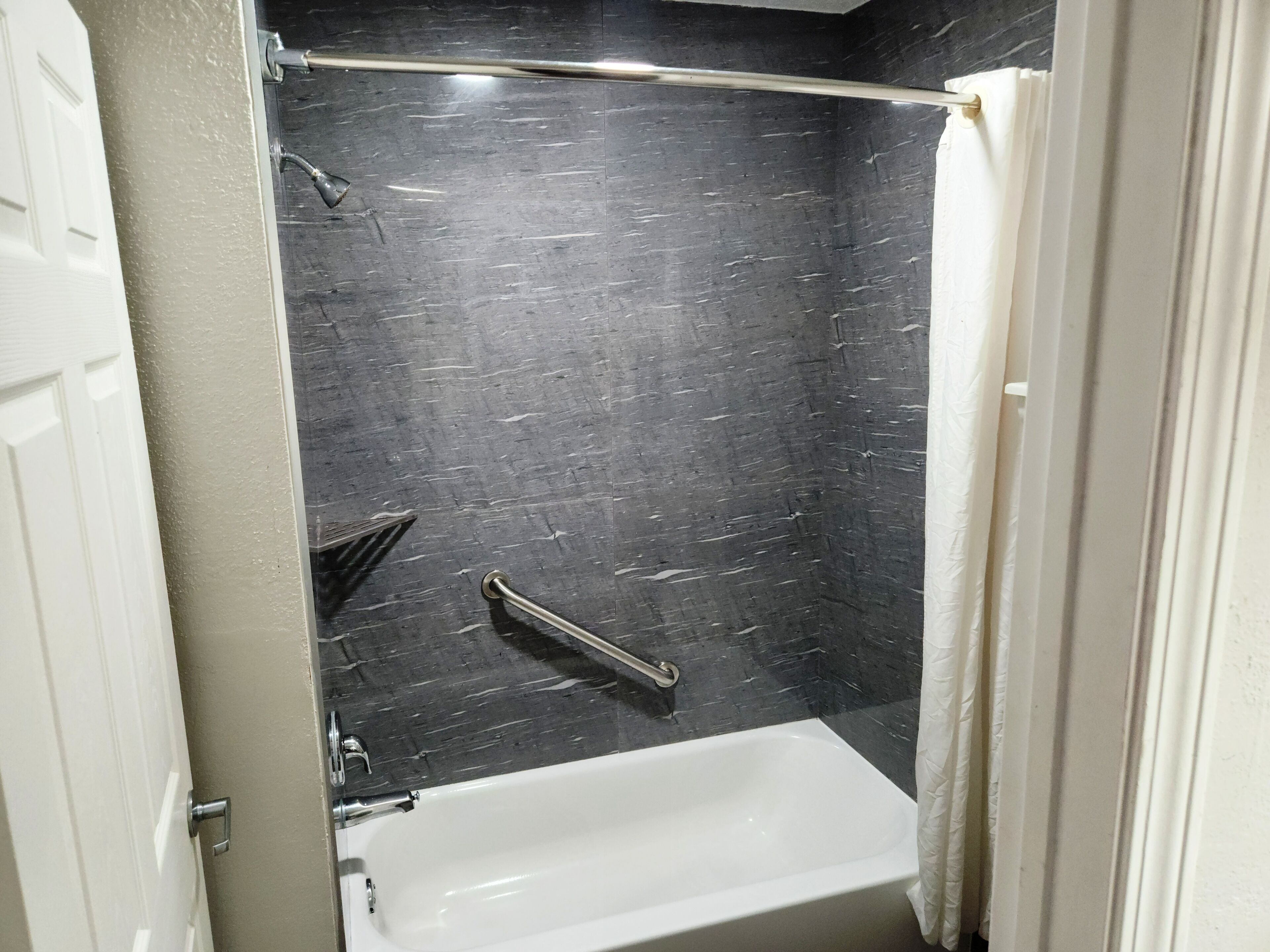 combined shower/bathtub, free toiletries, hair dryer, towels