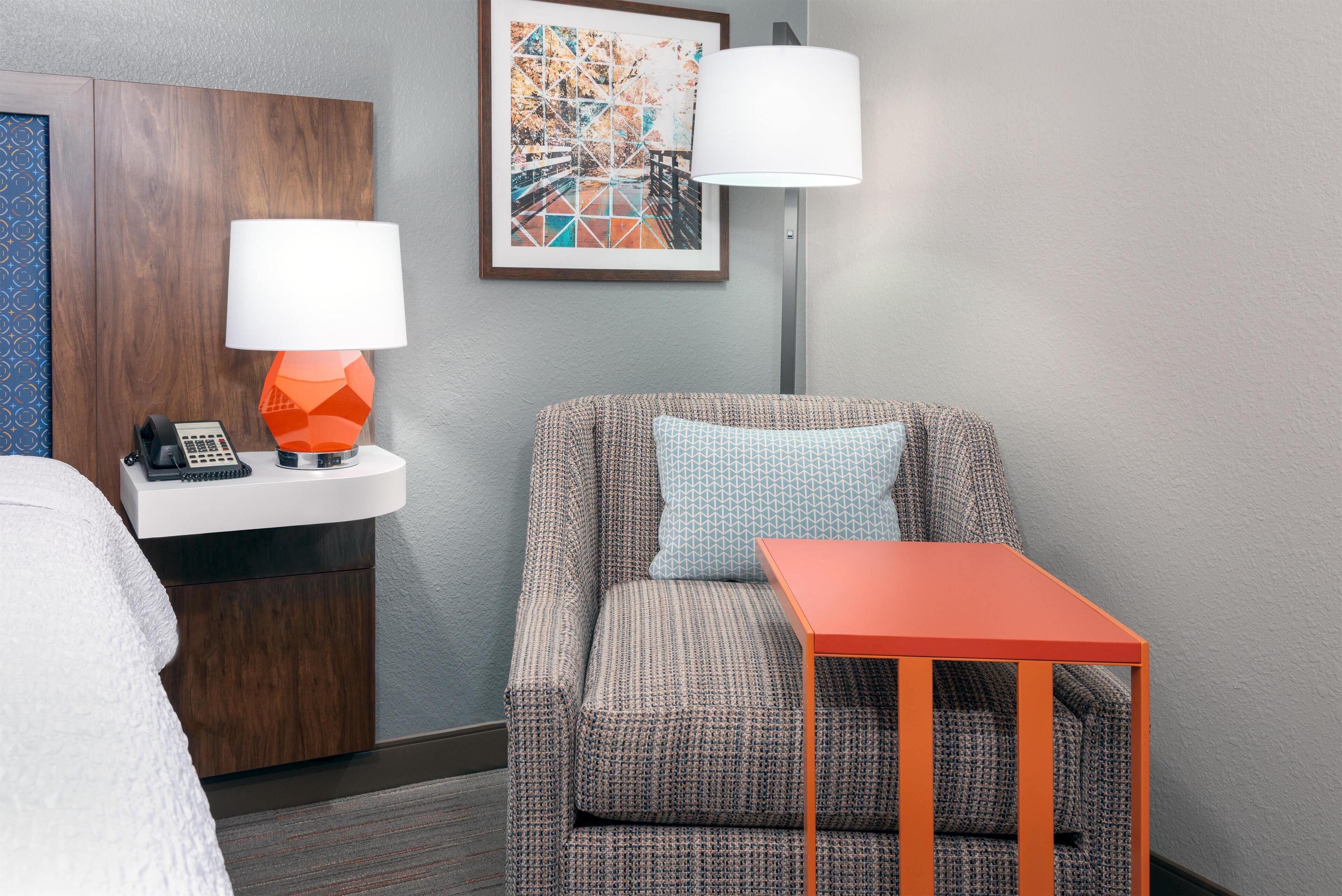 Premium bedding, desk, laptop workspace, iron/ironing board