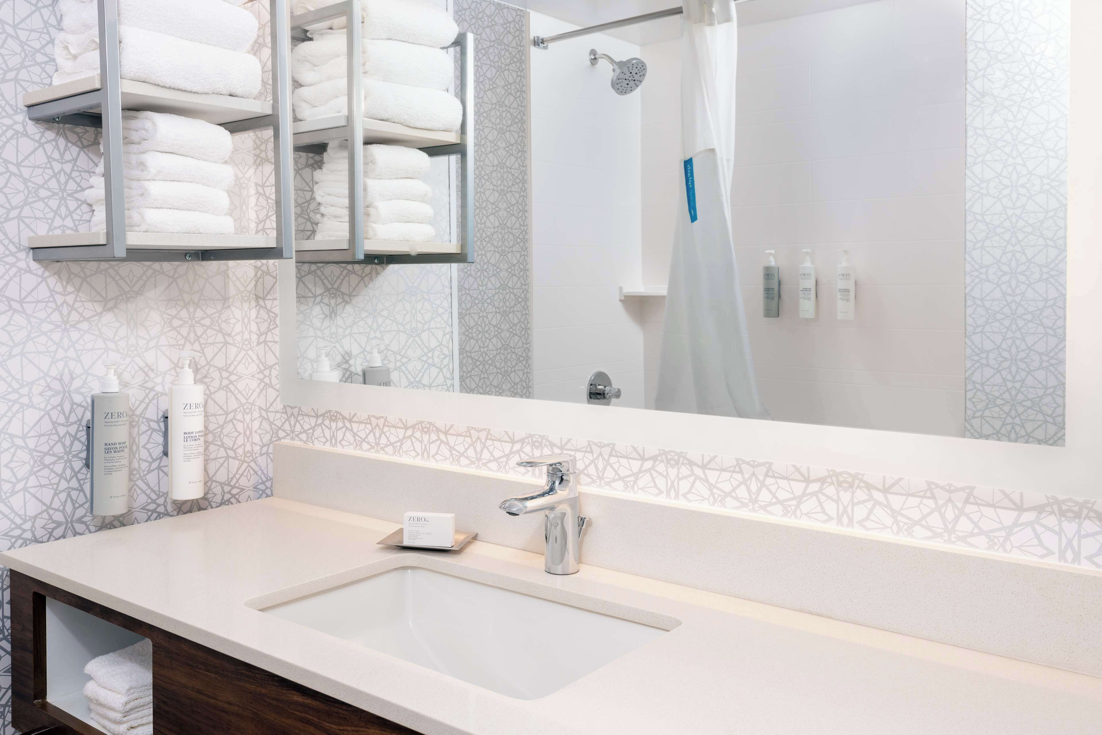 combined shower/bathtub, free toiletries, hair dryer, towels