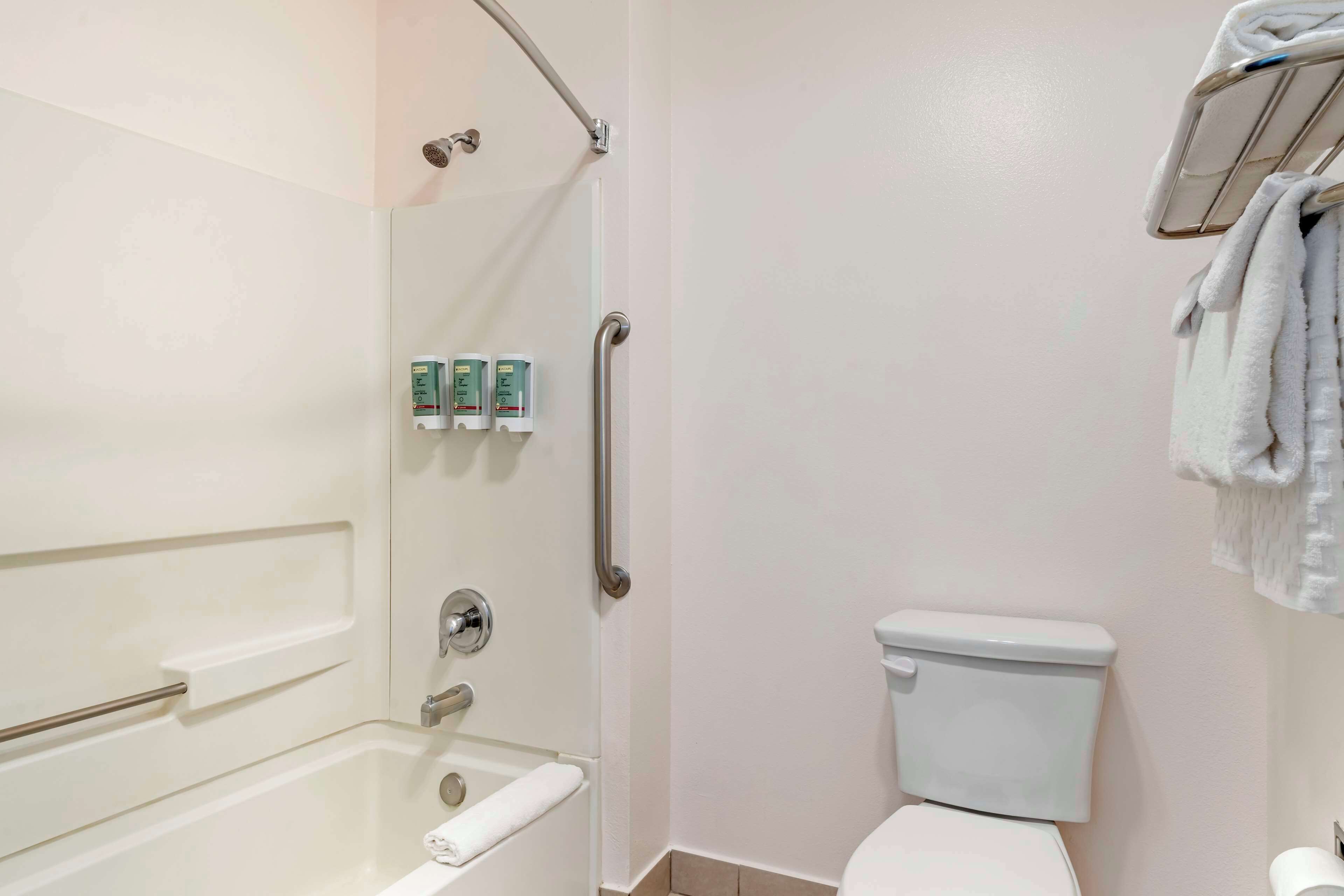 combined shower/bathtub, free toiletries, hair dryer, towels